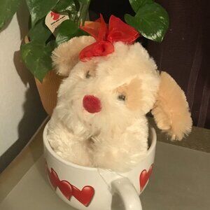 Dan Dees Collector's Choice 12 oz mug with adorable soft tan stuffed puppy.